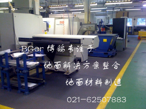 生產(chǎn)車間地面起砂、耐油污處理采用重型設(shè)備生產(chǎn)車間地板